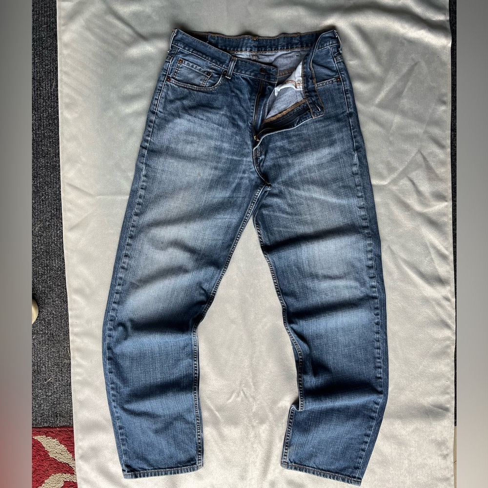 Faded Levi’s 550 jeans